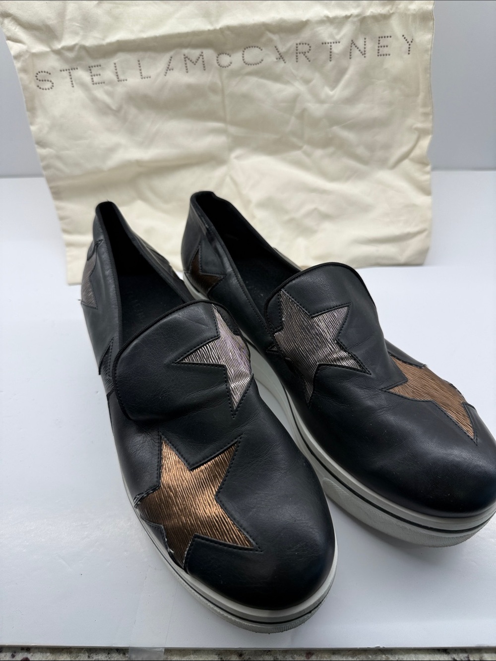 Stella McCartney Black Slip-On Sneakers with Metallic Star Appliqués